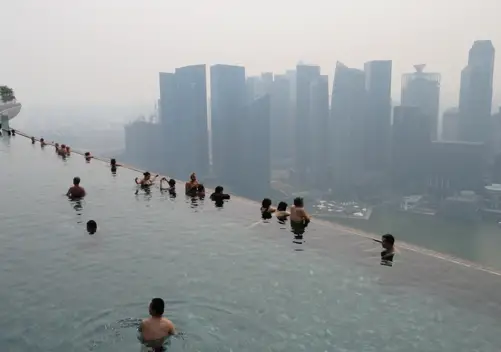Sip on a cocktail overlooking the infinity pool