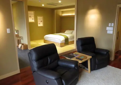 A deluxe western room with private onsen