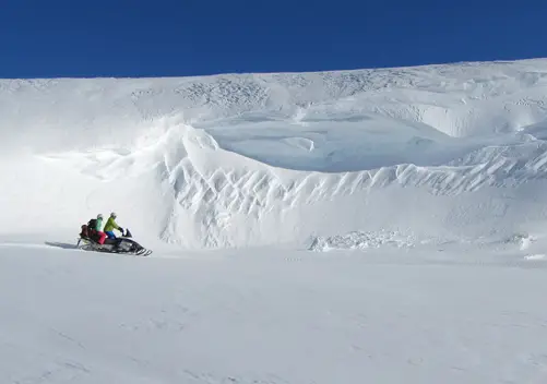 Exploring on a snowmobile