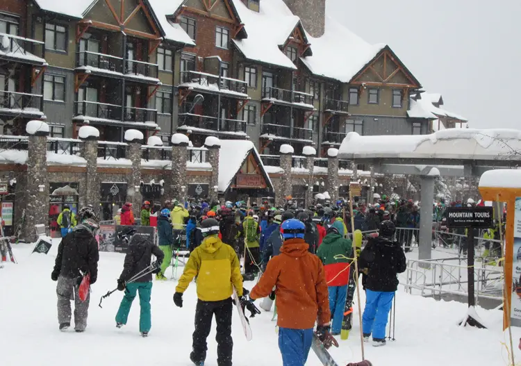 Queues for the gondola on a powder day are not pretty