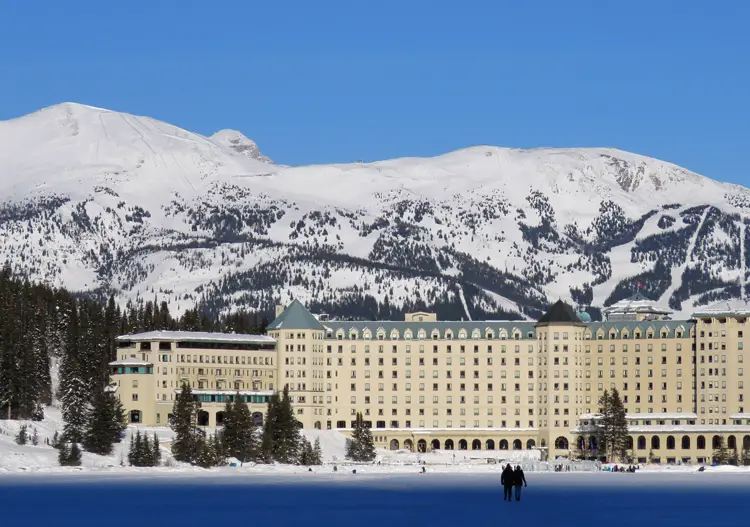 The chateau with the ski area way in the background