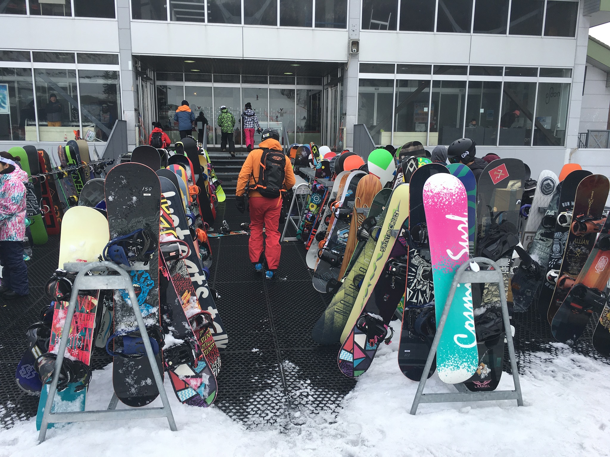 Trying to find a pair of skis in a sea of snowboards