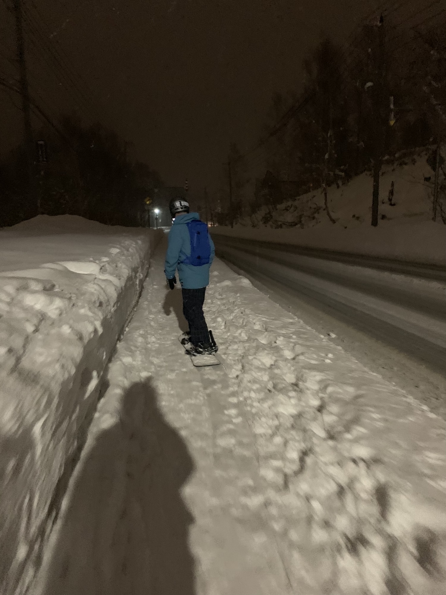 From the bottom of Hirafu you can ski the sidewalk all the way home