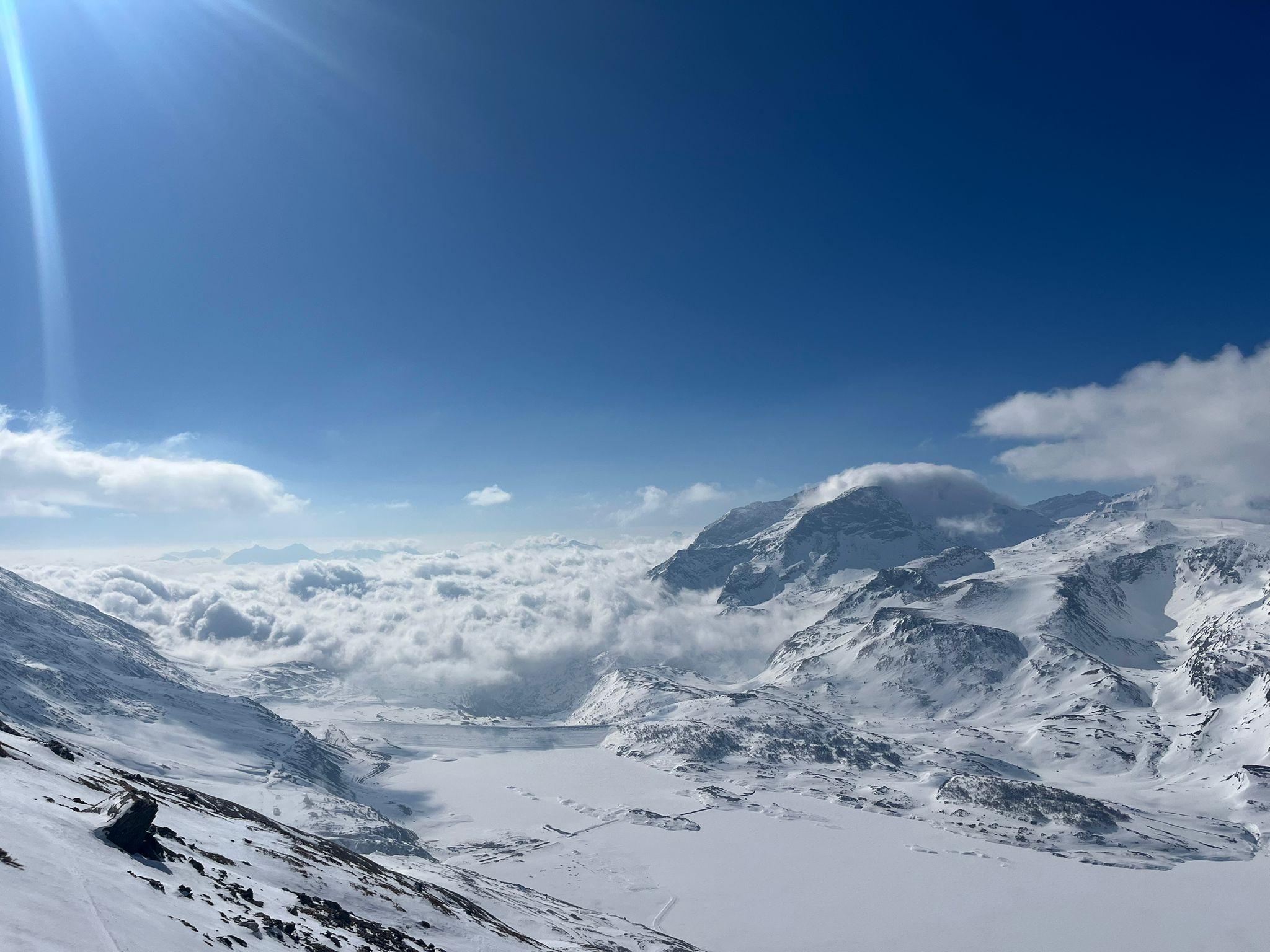 Panorama over the Mont Cenis reservoir towards Italy at 2800m