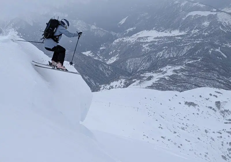 Leap into untracked powder in the mountains of Georgia