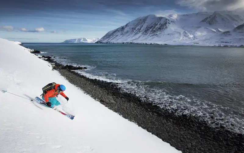 Summit Heliskiing all the way to the beach at the Troll Peninsula in Iceland