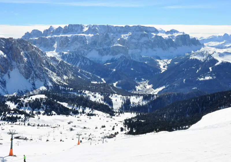 Selva-Wolkenstein village lays deep in the valley below the Sella massif in Val Gardena