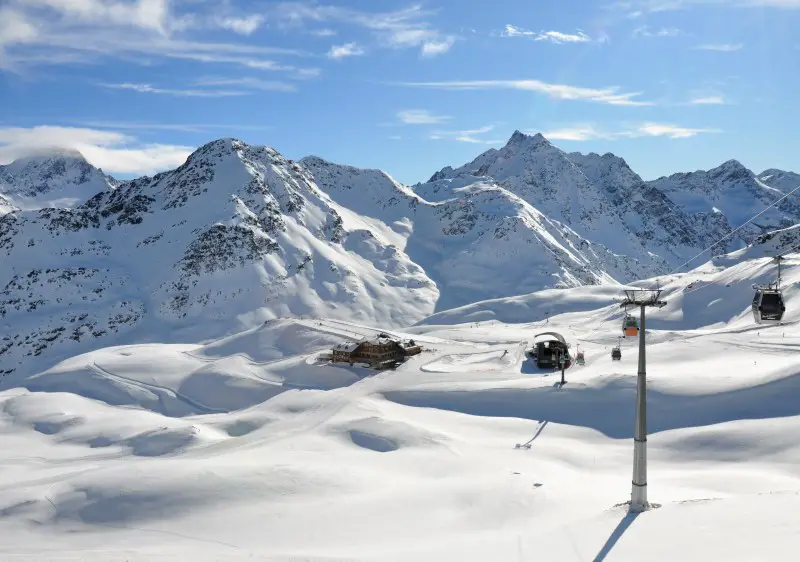 The gondola drops down into the Vallalpe backside of Santa Caterina Valfurva ski resort, Italy.