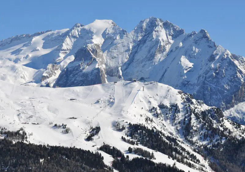 Val di Fassa ski resort in the Dolomites with the Belvedere & Marmolada looming behind