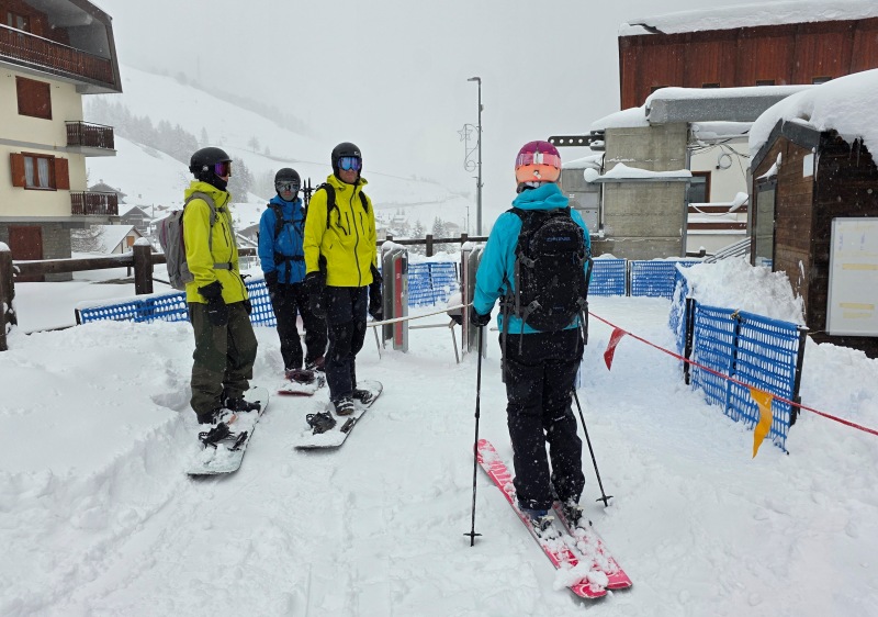 Powder day lift line consists entirely of our group in Boragata Sestriere