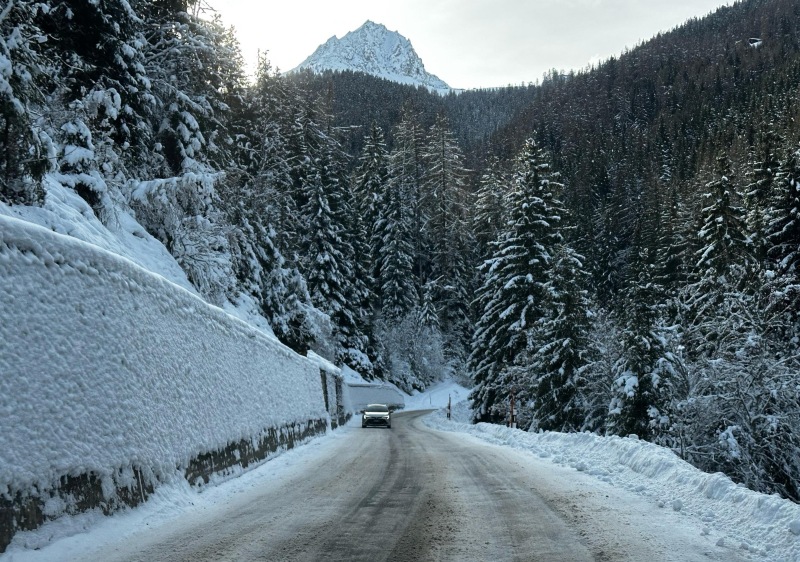 A wide section of the road to the car park