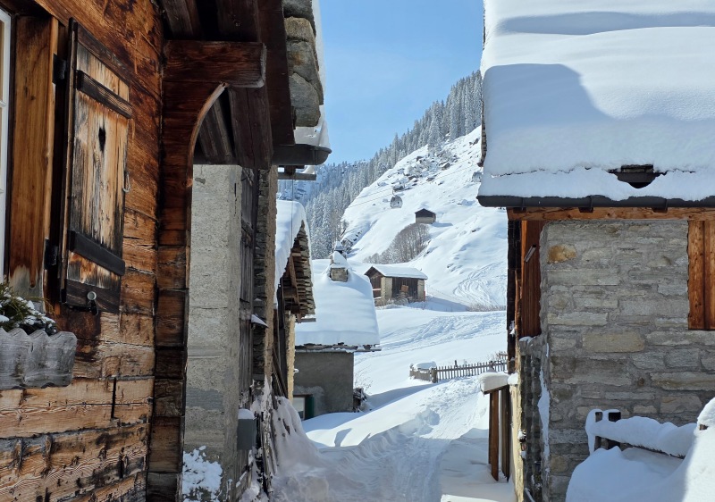 Entry to Leis hamlet under the gondola line at Vals