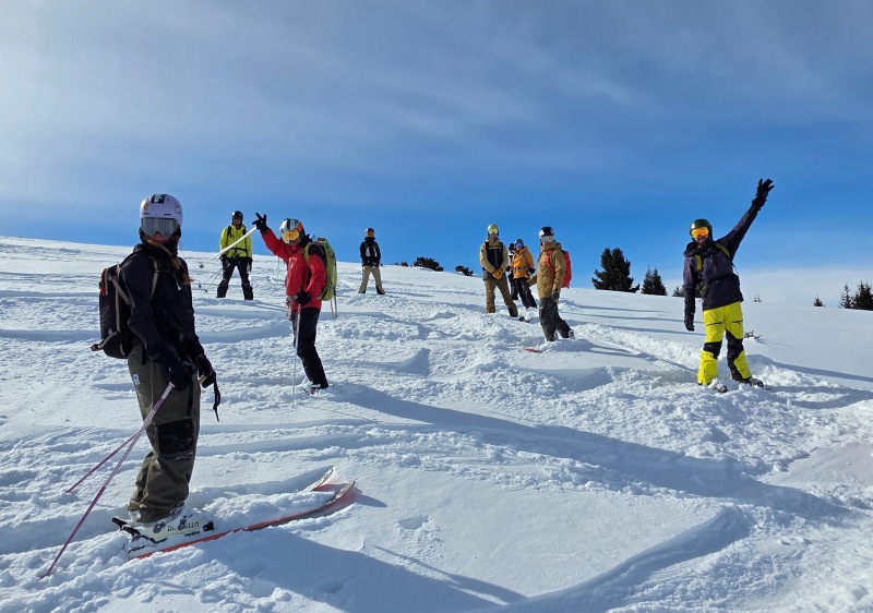 Happy cat skiing crew